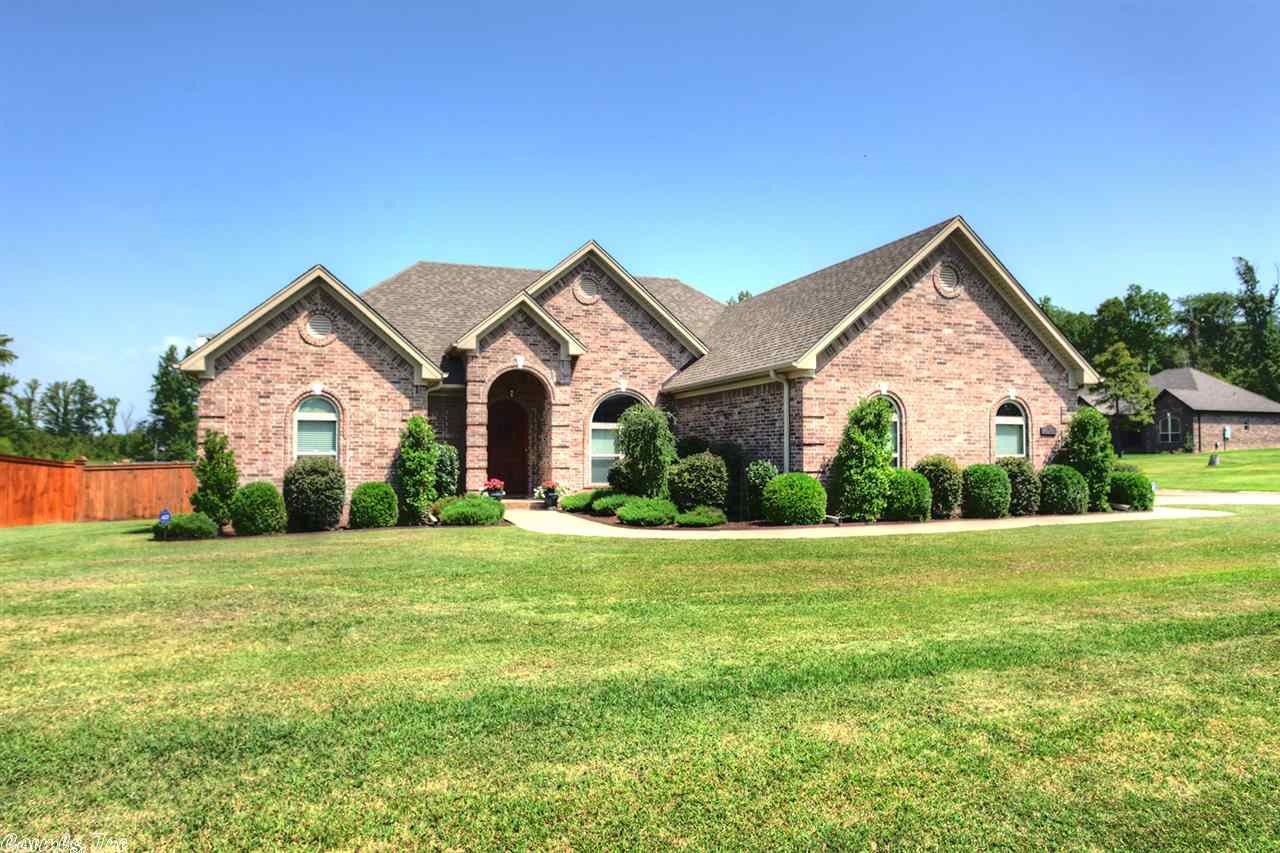 Do Yourself a Favor and move into this fantastic home where it's all been done---beautifully. You'll adore this 4 bedroom, 2 bath traditional tucked away in the heart of an exclusive area. With gas fireplace, large kitchen with pretty stained cherry-wood cabinets, patio, hardwood flooring, trim detail to the hilt, tall ceilings, formal dining, you can enjoy life in this one because there's nothing to do!! A hassle-free house for only $213,000.