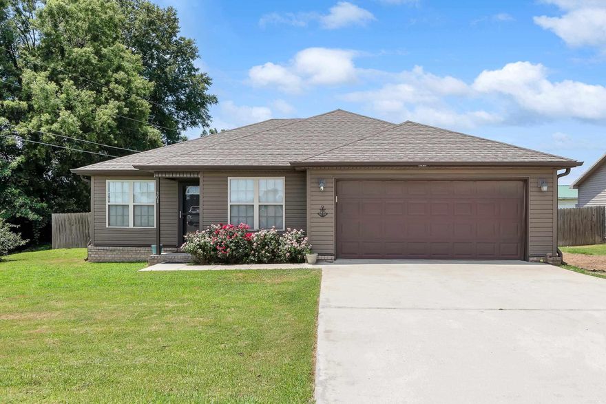 Welcome to your dream home at 301 N Oak St, nestled in the heart of Brookland! This charming 3-bedroom, 2-bathroom gem boasts a spacious 2-car garage, ensuring plenty of room for vehicles and storage. Indulge in luxury with a jetted tub, perfect for relaxing after a long day. The privacy-fenced backyard offers a serene retreat for outdoor gatherings or a peaceful haven for your morning coffee. Plus, with Brookland Schools just a stroll away, this home is ideally positioned for families looking for convenience and community. Don’t miss out on making this beautiful house your forever home!