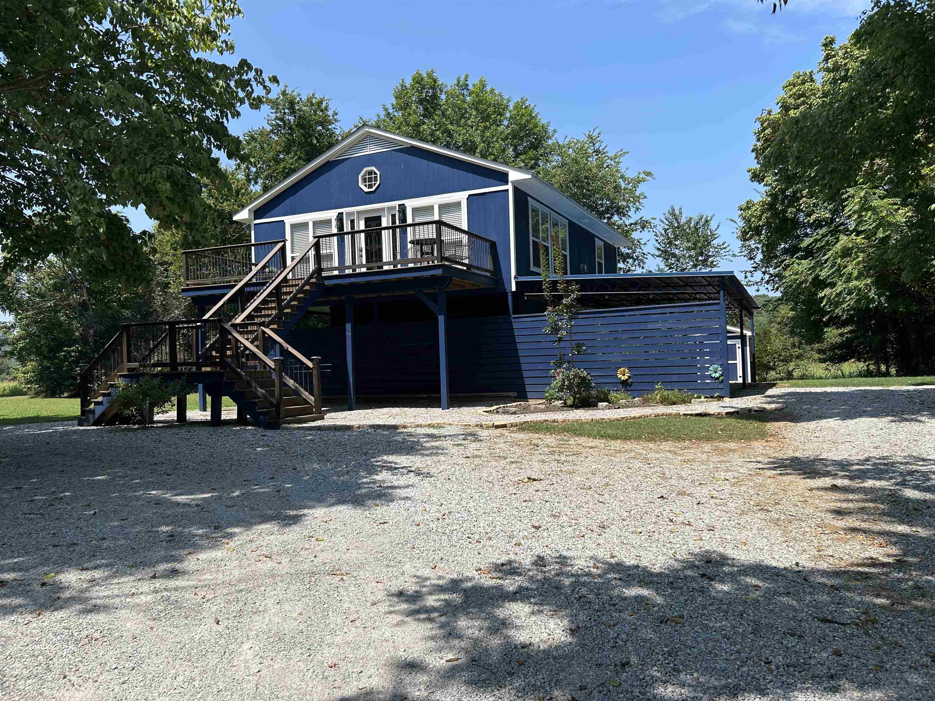 Fall in love with this GORGEOUS Custom built 2 bed, 2 bath home, nestled perfectly on a secluded dead-end road with breathtaking views of the White River and pastures. Every corner of this move-in-ready sanctuary invites you to relax and enjoy life, featuring a charming upstairs living space, a downstairs work area with a garage-stile glassdoor, or screen, and an inviting space for gathering with loved ones. Spanning 1,550 sqft, the thoughtfully designed interior offers the perfect setting to create cherished memories. Located on the White River in the highly sought-after Mountain View region, this enchanting property is a dream come true for nature lovers and is an ideal retreat for anyone looking to escape the hustle and bustle. This beautiful home comes fully furnished, and its stunning views are a must see! Act now! Don't miss out on this serene oasis!