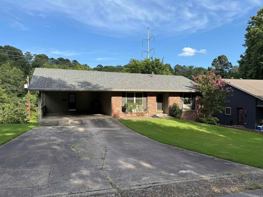 Large 2 level 4br 2ba Just off W Markham & N Hughes, Ready for your updates and finishing touches. 2650sq ft with 2 car carport, 1/3 of an acre lot with fenced yard. 2 bedrooms and 1 bath upstairs. 2 bedrooms and 1 bath downstairs along with 2nd living room, wet bar, and a ton of basement storage.  Living room and separate dining area on upper (walk in) level. Fridge and washer & dryer convey. Seller paying $750 1st year warranty.  ***Seller paying $4000.00 toward buyer's closing costs or interest rate buydown with accepted offer!  Agents be sure to review remarks.