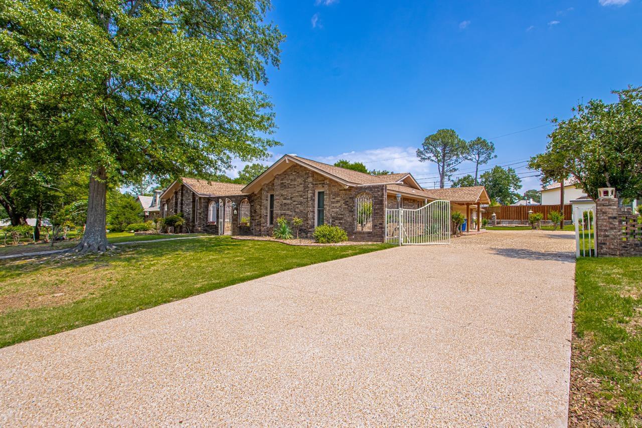 Very nice home in Shady Valley Subdivision. New Arichtectural Roof in 2023. New paint in 2025 on exterior of home. 3 bedrooms, 2 1/2 bath. Large formal dinning and living room combo. large Den with brick fireplace. Eat-in kitchen with wet bar. Huge covered patio great for cookouts. . Extra wide driveway with plenty of parking with sideload 2 car garage with storage building next to it and another storage building in back yard. . Very large lot for outside activities. Come see this home you will be glad you did." See Agent Remarks"