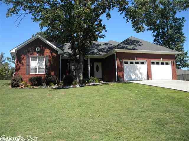 GREAT LOCATION with lake view and access just across the street. Very attractive brick home on corner lot with iron fenced yard, covered patio and nice landscaping. Enjoy large open living, dining and kitchen. Split bedrooms, large utility rm., floored attic, jetted tub in master, crown molding, hot water faucet outside and more.