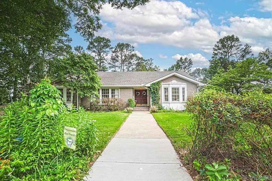 Lovely traditional home with room for everyone! Convenient mid-town location on a quiet street, near schools, hospitals, shopping. Great floorplan for family living and entertaining. Beautiful hardwood floors. Spacious kitchen, formal living room and dining room, large family room with gas log fireplace, breakfast area, primary suite with new spa-inspired bath and closet, home office (could be 5th bedroom) powder room, fabulous deck, all on main level. Den with gas log fireplace, three bedrooms, two bathrooms, oversized laundry room, abundant storage and walk out covered patio downstairs. Two car garage with storage, nice driveway. Exterior features include upper and lower decks, patio, outside storage area under garage, guttering with covers, lawn sprinkler in both front and backyards, new retaining wall, dog run with chain link fencing. This home is a must-see! Kitchen Refrigerator and additional refrigerator in laundry room convey but are not warranted. Agents: please see remarks.