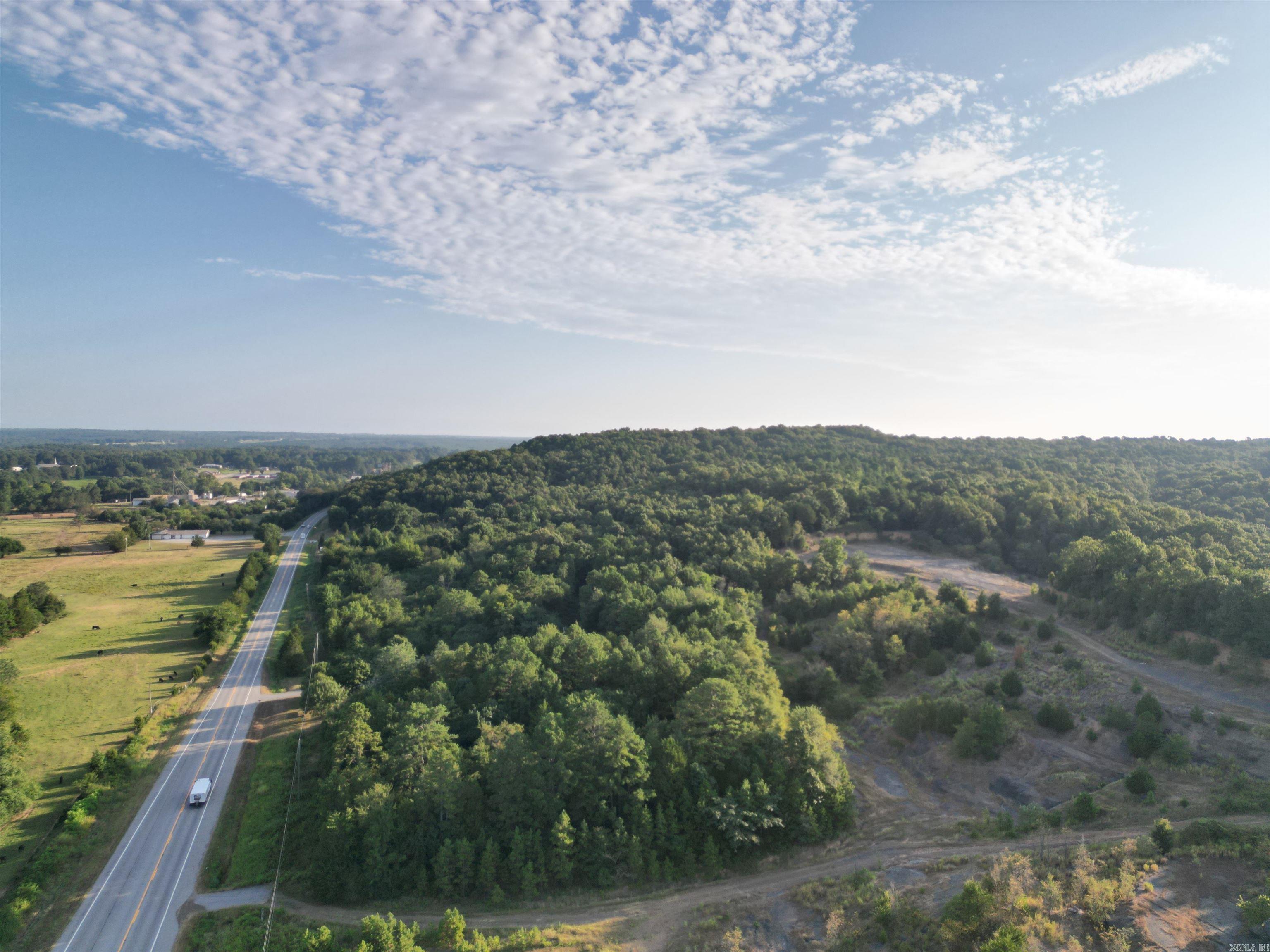 For Sale: 83-acre prime property in Rose Bud, Arkansas featuring a shale pit and abundant marketable timber. Boasting an impressive 3,141 feet of highway frontage, this tract sits on a high-visibility corridor with 6,000-8,000vehicles passing daily making it perfect for commercial, industrial, or development opportunities. Whether you're looking to harvest timber, expand operations, or invest in land with income potential and road exposure, this rare offering combines natural resources with unmatched access. Don't miss out on this high-traffic, high-potential property.