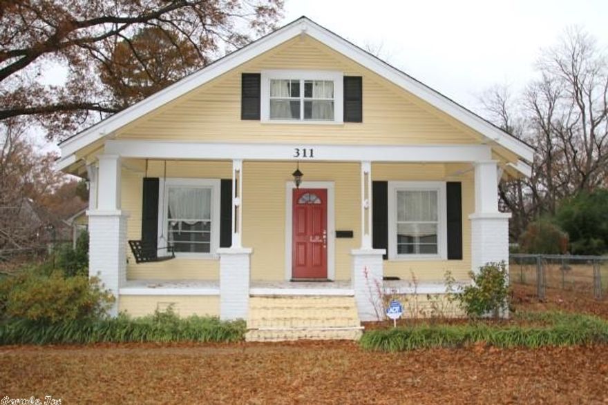 Charming 4 bedroom, 2 1/2 bath Craftsman home across from Central Baptist College. Great front porch with swing. Cozy up to the warm electric fireplace in the living room. Fabulous master suite upstairs with lots of storage and an endless bathroom featuring a great walk in closet.  Separate large laundry room/mud room with half bath off kitchen.  Huge fenced back yard and storage room with electricity.   Home has lots of charm and character on two flat lots. HVAC approx. 3 years old.  Must see!