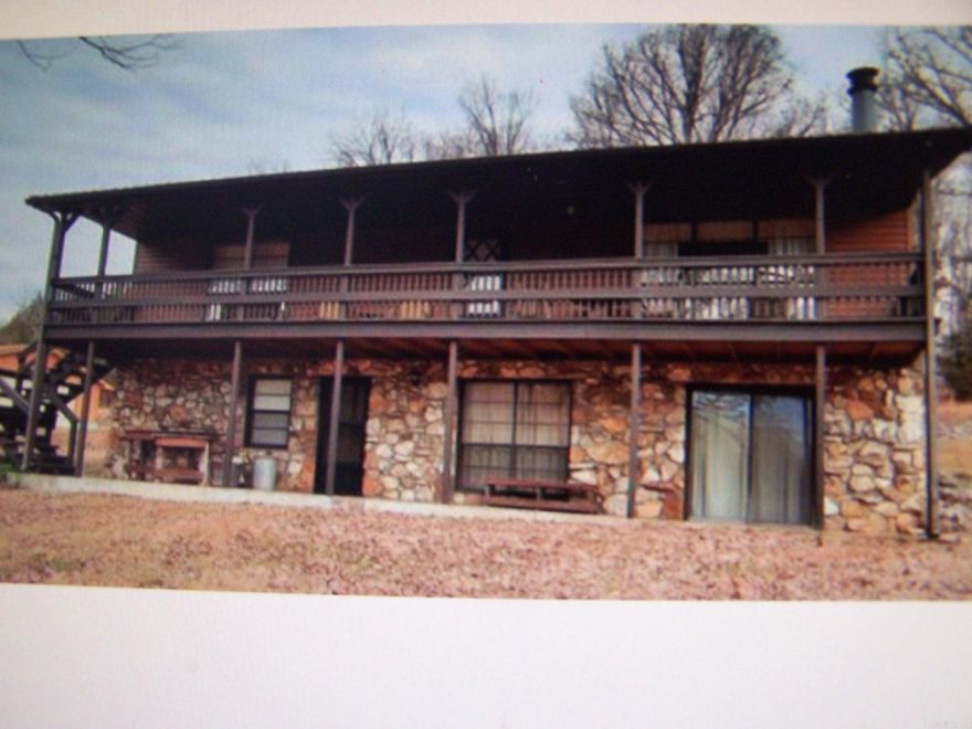 This home has 3 bedroom and 2 1/2 baths.  Living Room, kitchen and dining is open concept. There are 2 bedrooms and 1 of the baths is located downstairs. The 40 acres is primarily wooded.  Property is gated and has varying terrain.  There is a private drive leading from Hwy. 63 to the home and headquarters. Private and secluded and idea for a forever home or Ozark vacation get a way.