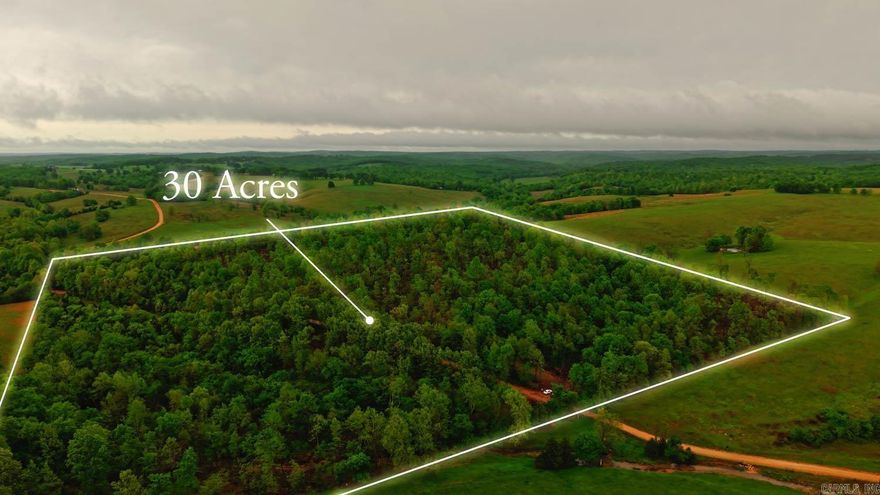 30± Acres Unrestricted Land Near Mammoth Spring, Arkansas  Located just outside Mammoth Spring, this 30± acre tract offers an excellent opportunity to build, invest, or create your own private Ozarks retreat. With no restrictions, you have the freedom to use the land however you choose—whether for a full-time residence, hunting property, or recreational getaway.  Recently logged, the property provides improved access and a clean slate for development. The open terrain makes it easy to navigate while allowing you to shape the landscape to fit your vision. A natural homesite sits atop the hill, offering elevated views and an ideal setting for a cabin or home.  With county road frontage, access is simple and convenient for immediate use or future plans. The land features a mix of open ground and natural elements, including a wet weather creek along the southwest corner that adds character and attracts wildlife.  Combining versatility, accessibility, and a desirable location near Mammoth Spring, this property is a great opportunity in the growing northern Arkansas market.