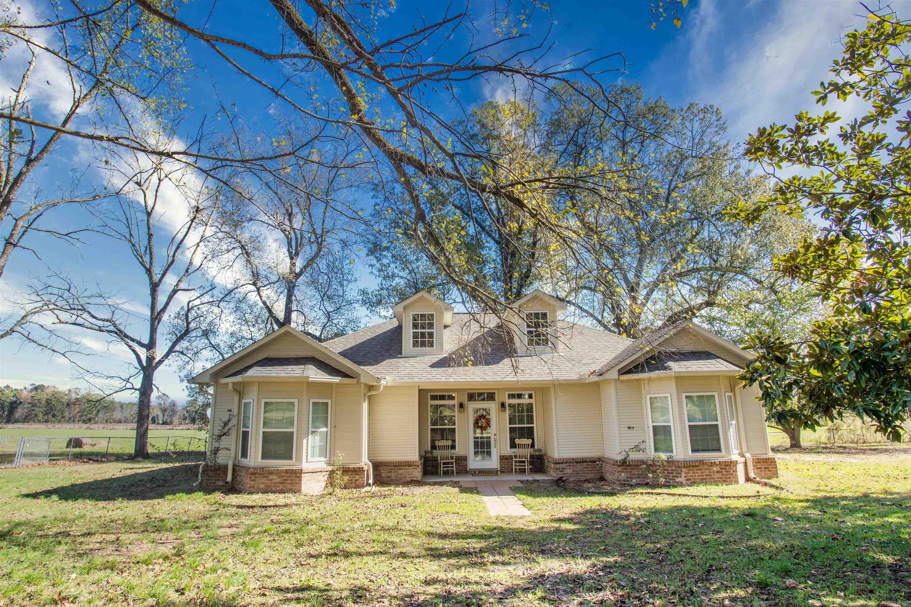 You won't believe the amazing layout of this property! This beautiful home features 16.6 acres of land, 3 spacious bedrooms and 2 full bathrooms. Built in 2017, this newer home checks all the boxes with an open floor plan, a large laundry room, 9' ceilings throughout with custom tray ceilings in both master bedroom and dining room, beautiful French doors in the dining area welcome you out to the patio overlooking the beautiful 16 acres. Need a home office? This has a room perfect for that right off the large living area! This home will qualify for Rural Development financing, for possible $0 down! Call today to schedule your appointment to see this one!