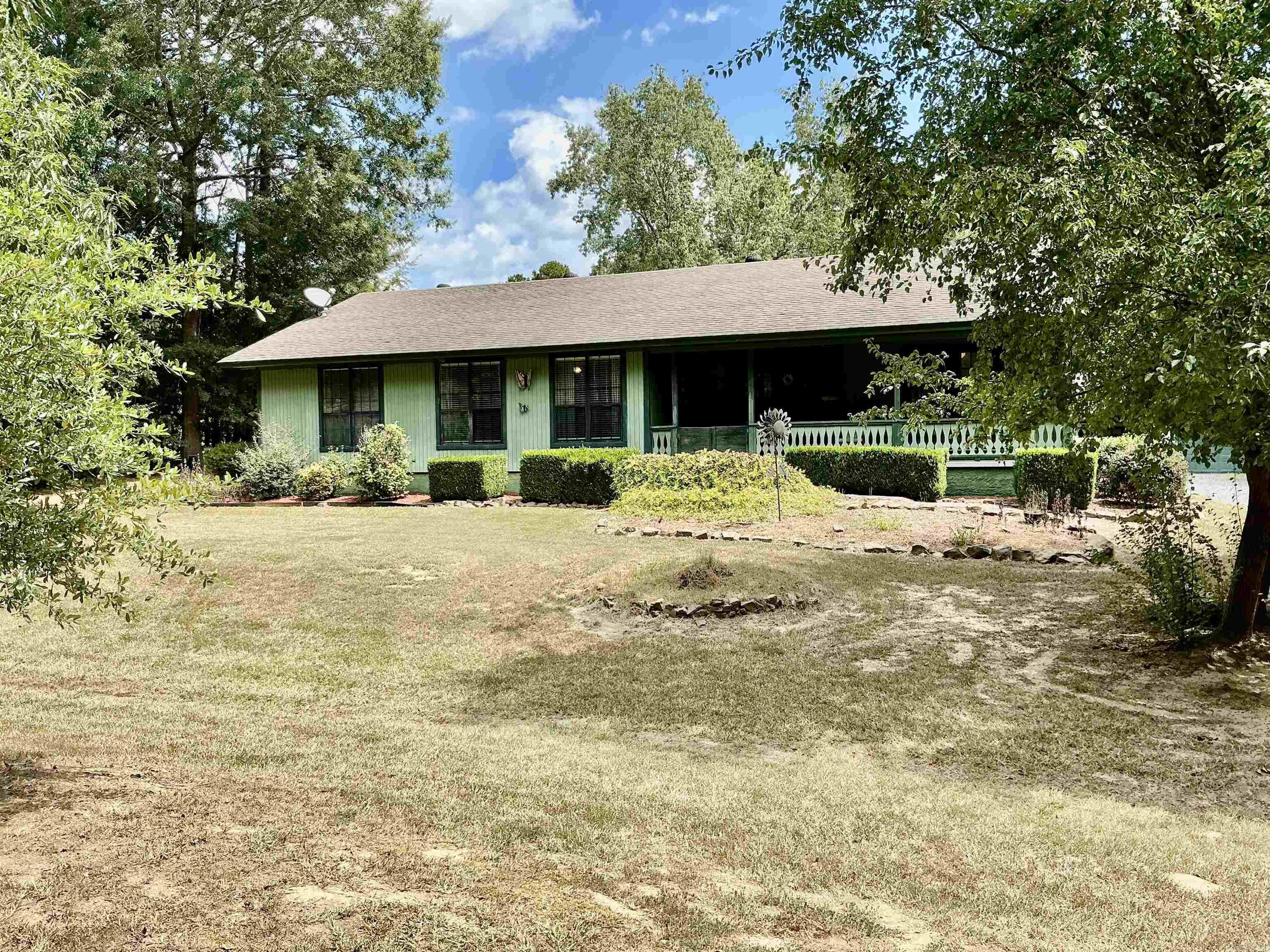 Cute home tucked away in quiet Winter Creek Subdivision. Home comes with a separate garage/shop and another outbuilding that could be a she shed or man cave. Property is one+ acre. Enjoy the peace and quiet from the front porch to the great back yard with plenty of space for a garden or fun family activities. Come see this sweet gem. Property to be sold as is.