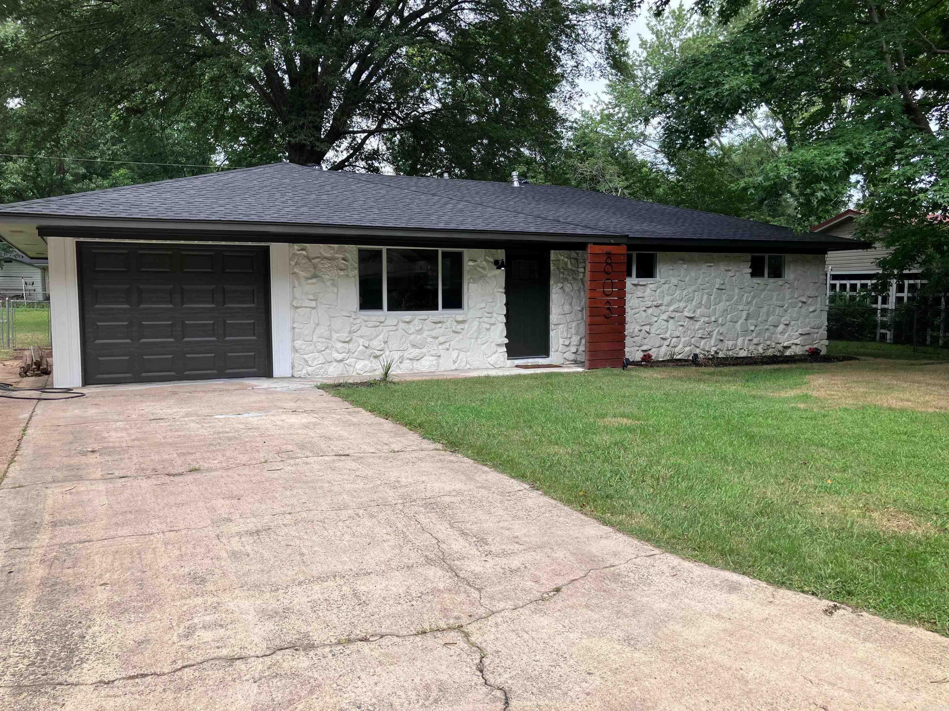 Experience modern living at its finest in this fully remodeled 3-bedroom, 2-bathroom home, completely transformed from the ground up! No detail has been overlooked in this impressive renovation that is located in a quiet, well established neighborhood in Bald Knob. Step inside and be greeted by a bright, open-concept living space featuring LED lighting throughout. The kitchen features granite countertops, ample cabinetry, a large pantry, and a garbage disposal. This home has all new features, including a brand-new roof, HVAC system, water heater, windows, you name it. Outside, you'll discover a large, fully fenced-in backyard, perfect for pets, play, or entertaining. There is also a shed that would be great for storage or a workshop. The front of the house has been given a fresh, modern look. The garage is insulated, and Entergy has also added extra insulation in the attic. Book a tour today! Agents, see remarks.