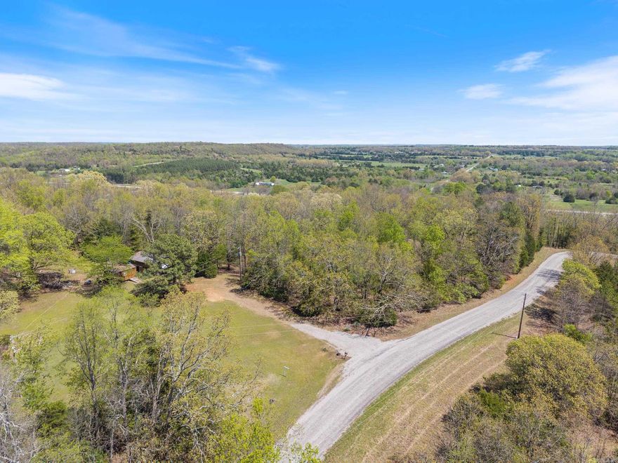 Beautiful piece of land with water, septic and electric, ready for the perfect home. See agent remarks.