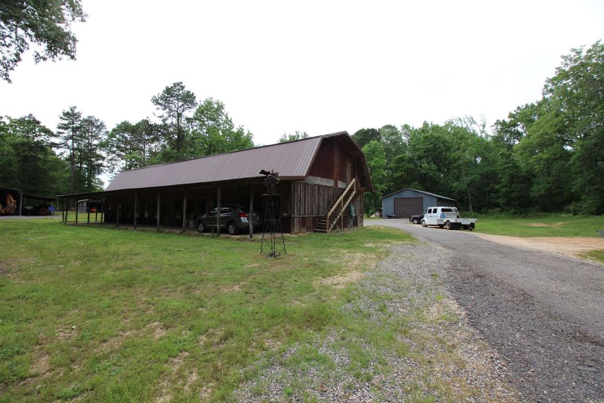 Investors dream. Three homes on 17 acres with pond, creek, mini storage business. Huge heater and cooled workshop with pole barn for parking boats, tractors, and other equipment out of the weather. Come check out his property before it's gone.