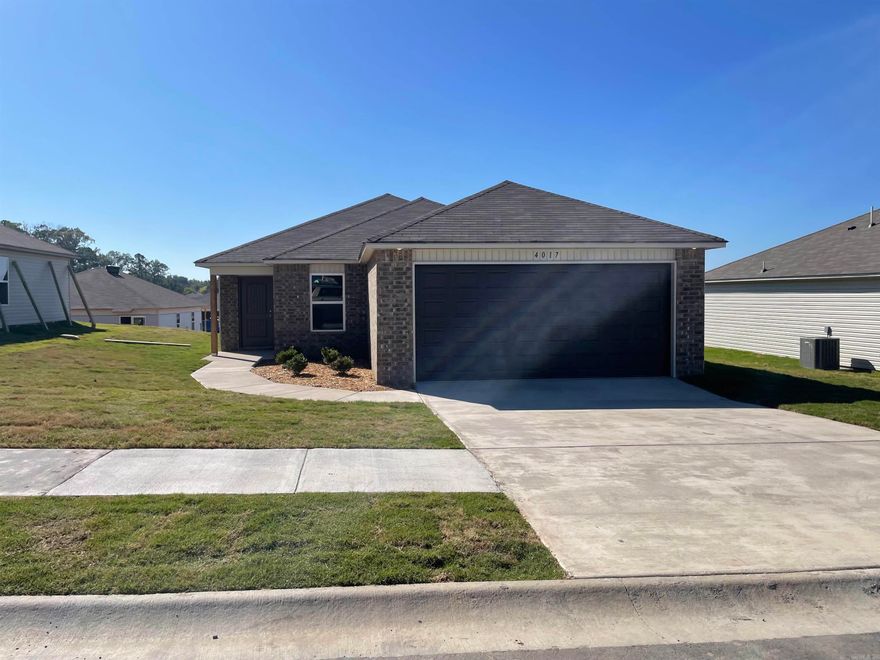 Armstrong plan Upgrades in this home: soaker tub/shower combo in Master Bath, plumbing faucet upgrade 2, 8" deep Kitchen sink, additional drawer stack in Master Bath, 16" laminate bar top in Kitchen, Luxury Vinyl Plank flooring in wet areas and Living Room and adjacent hallways, sloped ceiling raised 1' in Living Areas per municipal code, Cheyenne style interior doors, baseboards level 2, additional LED disk light in Master Bath and Bathroom 2, microwave hood combo with electric smooth top self cleaning range, full sod.     Hilldale Crossing is convenient to HWY 5, the HWY 30/430 interchange, and Outlets of Little Rock.