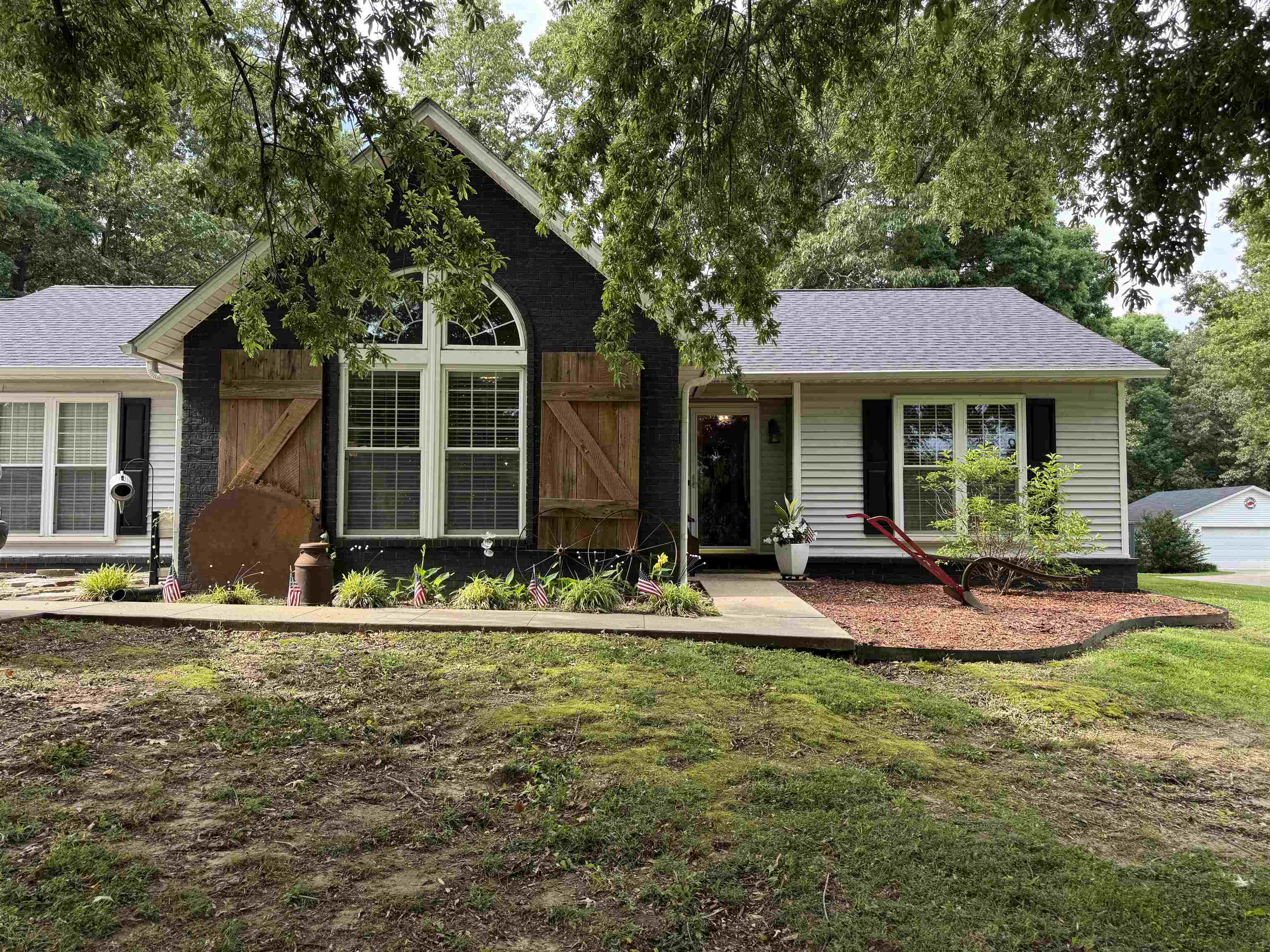 Talk about curb appeal!!!! This beautiful home is immaculate, and their well-manicured landscape shows off the sellers love for vintage decor. This charming home has three bedrooms, two bathrooms, 1750 sq ft, shop, and 1.26 acres. The roof is 3 years old, HVAC is 8 years old, and brand-new water heater. Call today to schedule your showing.