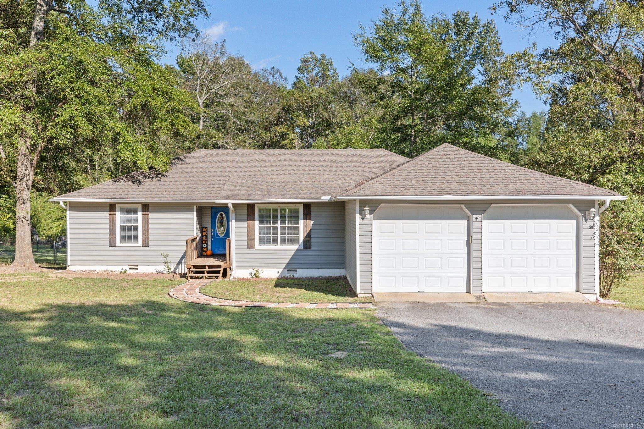 This stunning 4-bedroom Saline County home is situated on a spacious 3-acre lot, offering ample room for both relaxation and recreation. A standout feature of the property is the 40x20 shop, which includes two overhead doors, a convenient half bath, and a dedicated office spaceāideal for hobbies, projects, or even running a small business from home. As you step through the front door, you'll be greeted by an inviting open floor plan. The large great room, complete with a cozy gas fireplace, provides the perfect setting for family gatherings. The kitchen has modern stainless steel appliances and a pantry for your storage needs. There is a charming dining area, highlighted by a large window that frames picturesque views of the backyard. Outdoor living is a breeze with the home's lovely patio and deck, with beautiful trees that offer both shade and privacy. This outdoor space is sure to become a favorite spot. Located in the East End/Sheridan School District, known as one of the best in the state. Don't miss out on the opportunity to make this wonderful family home your own. Call today to schedule a viewing!