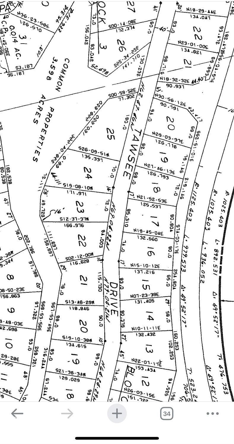 Wooded lot in Sandia Subdivision close to water.