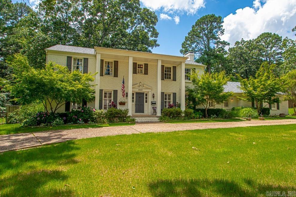 Rare opportunity to find a move in ready home in a great location a block from Pleasant Valley Country Club and within walking distance to schools, churches, restaurants, neighborhood pools and parks. 3/4 Acre lot, home sits way off the road with an extra large, flat and very private back yard with patio and plenty of room for a pool and/or endless outdoor living space. 4 Bedrooms including master suite up and a second Master suite downstairs- w/ a separate entrance. This space is very versatile and could be used as a home office, extra living space or in-laws quarters. Updated in classic, neutral finishes with site finished wood floors, fresh paint, plantation shutters, new carpet. Kitchen and all bathrooms have marble/stone countertops. PV property owners have access to parks, 2 pools, clubhouse and tennis courts.