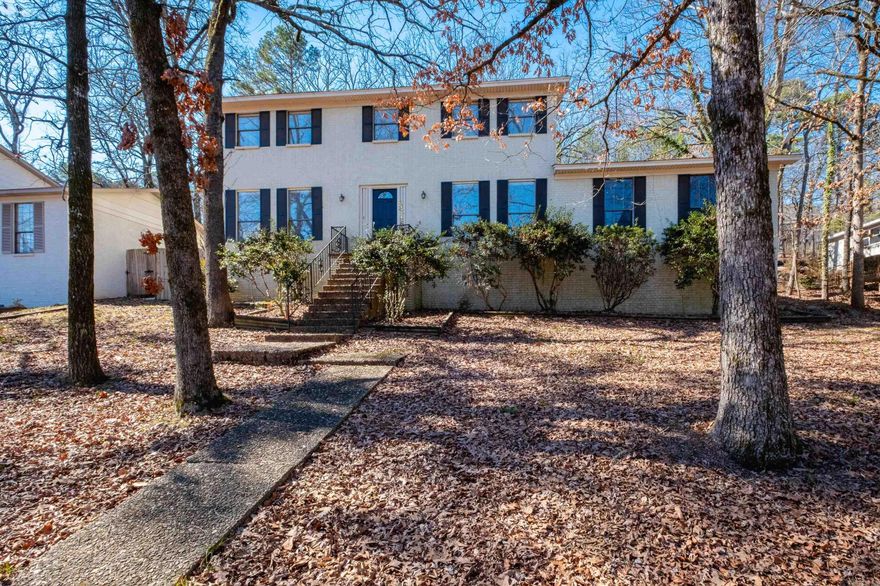 Oversized lot, nicely updated with new paint, new LVP upstairs, quartz in all bathrooms. Kitchen - Stainless appliances, granite counter tops, gas cook top, and built-in seating in eat-in dining. Shiplap dining room, 2 living areas with gas fireplace. Backyard with retaining wall creates level area for entertaining. Storage/workshop off of garage. Roof less than 10 years old, upstairs HVAC 2026, downstairs HVAC 2020. Great family home with neighborhood pool. Located in the heart of Little Rock.