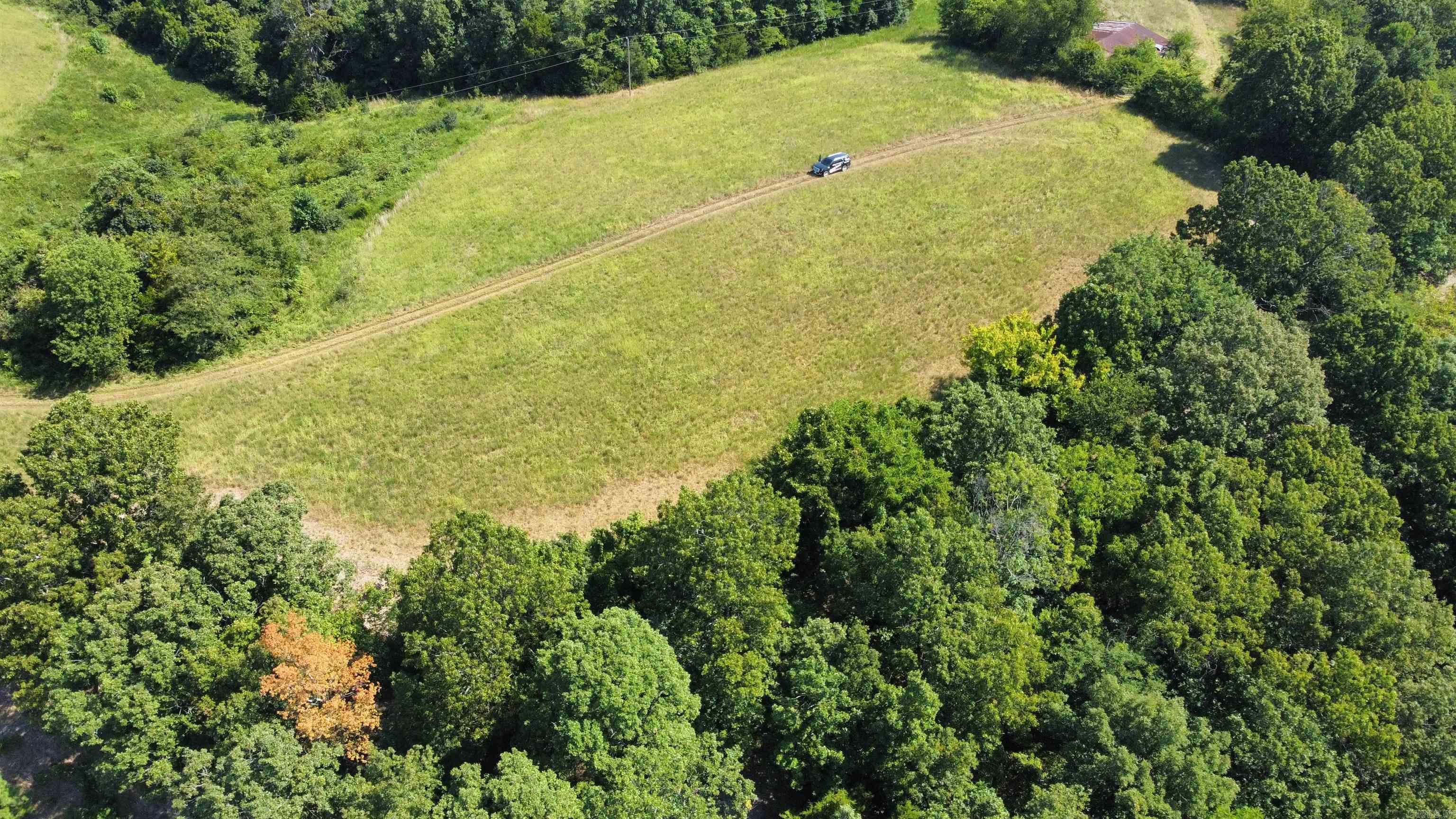 Discover your slice of the Ozarks with this stunning 38-acre tract offering endless possibilities and only 10 minutes from Mountain View. Perched in the heart of the mountains, this property boasts rolling terrain, mature hardwoods, and sweeping views that stretch for miles. A perfect mix of wooded privacy and open spaces provides prime locations for a dream home, hunting cabin, or recreational retreat. Abundant wildlife, fresh mountain air, and a peaceful setting make it an outdoor loverās paradise. Whether youāre seeking a private escape, a homestead site, or investment land, this property delivers the beauty and tranquility only the Ozark Mountains can offer ā all just a short drive from town conveniences.