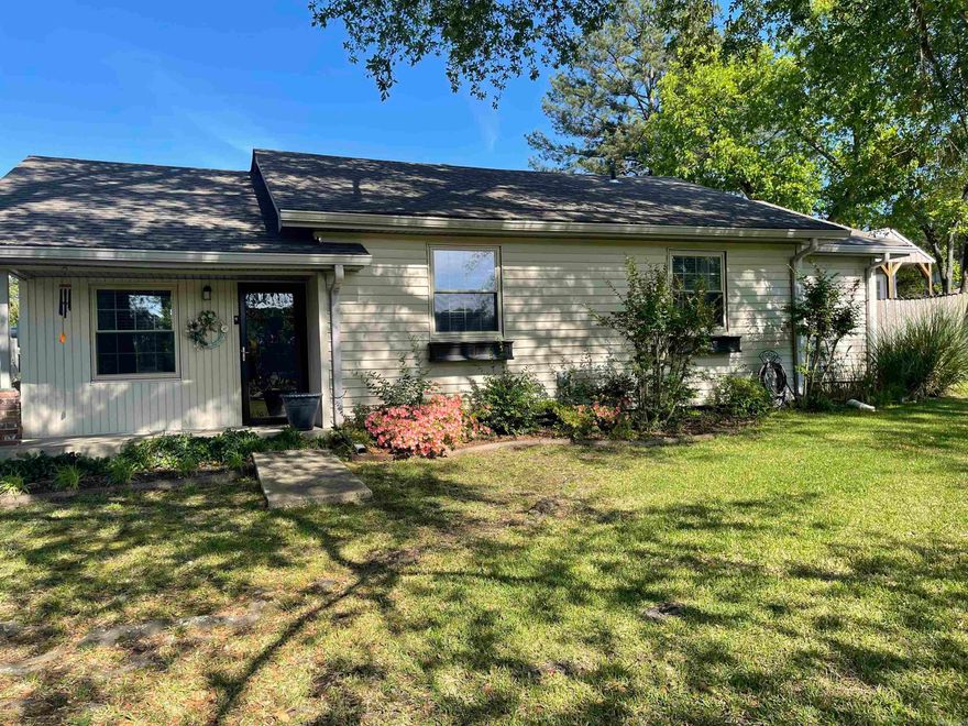 This is a dollhouse.  Three Bedrooms and two full baths.  Living Room has a fireplace.  Formal Dining Room and Kitchen comes with all appliances including Washer and Dryer.  Low traffic street and beautiful views.  Landscaping is beautiful and backyard is privacy fenced.