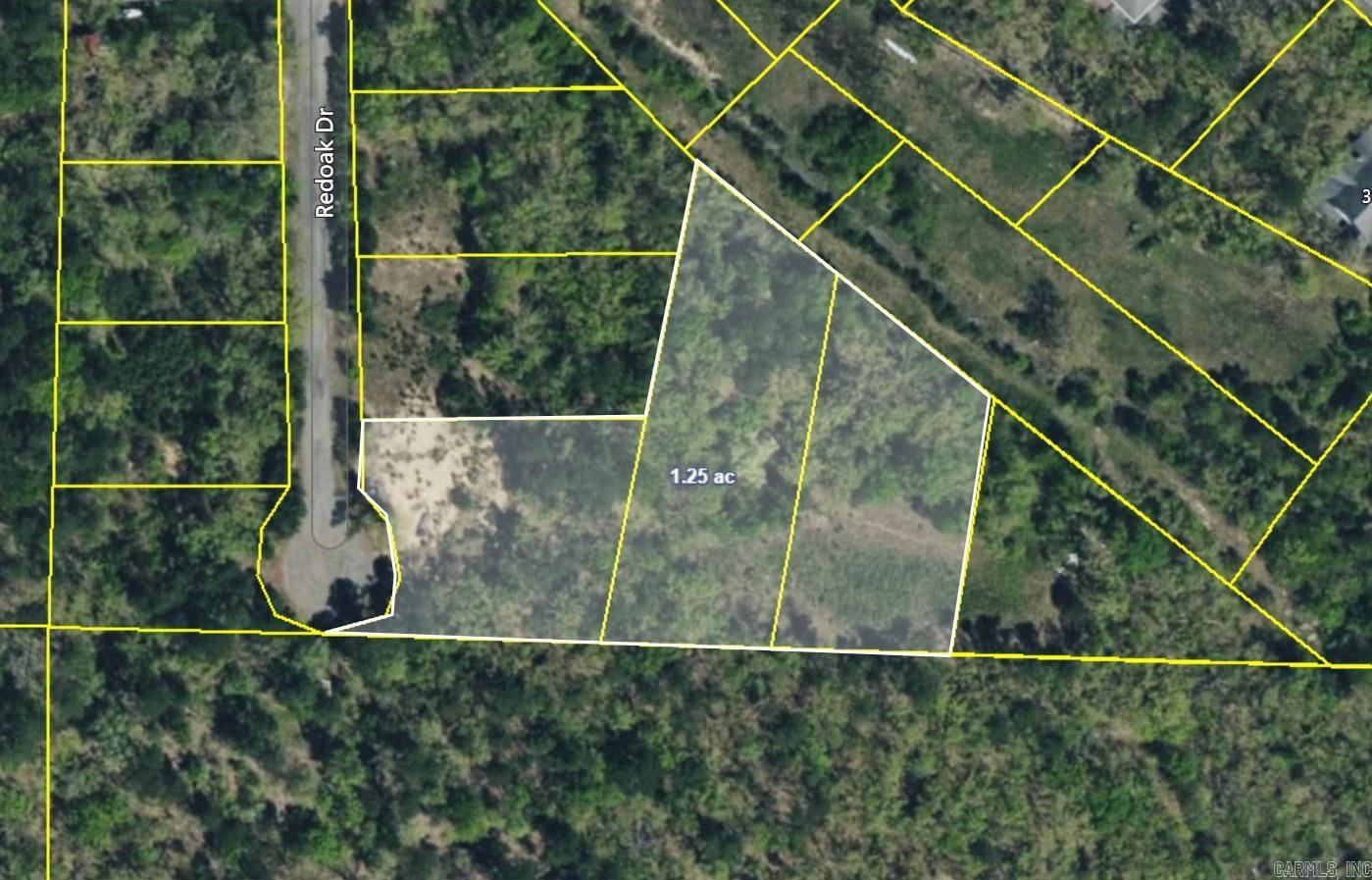 Looking for the perfect place to build your dream home? These three vacant lots are located at the end of Red Oak Drive. Lot 78 is cleared and ready for immediate construction. With a prime location at the top of the hill, youāll enjoy elevated views and a peaceful setting. Lots 76 & 77 ā Wooded lots offering privacy and serenity. Clear some trees to reveal beautiful views of the surrounding area, making it an ideal spot for a custom home. These lots offer an incredible opportunity to build in a tranquil, secluded area while still being conveniently located within city limits. Utilities available on Red Oak Drive. Road surface is milled asphalt. Lots are located 3 miles from the new bike trails at Ward Lake!