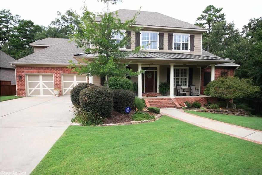 Stunning Southern Living home 4 bedroom/4 bath located on a quiet cove w/ green space in back & on right side giving this home quiet privacy. Solid oak hardwoods throughout most of the home. 2 story vaulted great room open into kitchen/family dining area w/ bay of windows! Formal dining. Office w/ closet, could be 5th bedroom. Gourmet kitchen w/ large butler's pantry, island, gas cook top, granite counter tops & stainless appliances. Lovely master suite. 2nd stairs leads to family room. Storage under home.