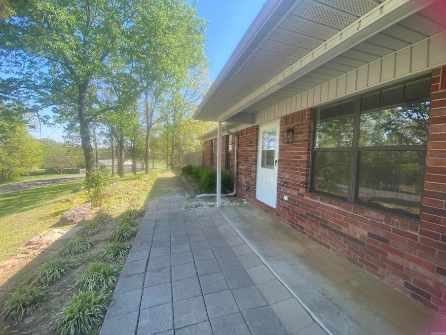 Rare find in the Springhill area of Greenbrier. Located at the end of a quiet cul-de-sac, this beautifully remodeled home offers privacy, charm, and a peaceful setting. The fenced yard includes a powered shed, lean-to, generous paved areas, and a large pergola perfect for relaxing or entertaining. Inside, everything has been updated within the past year, including the HVAC system, roof, hot water heater, appliances, quartz and granite countertops, flooring, paint, doors, windows, fixtures, toilets, and even sliding glass doors for the tub. This home has been exceptionally well maintained and is truly move-in ready. Surrounded by flowers and calm, it’s the ideal retreat. Directions: Take Elliott Road to Wine Glass Road, then Brannon Road to the end of Krista Layne.