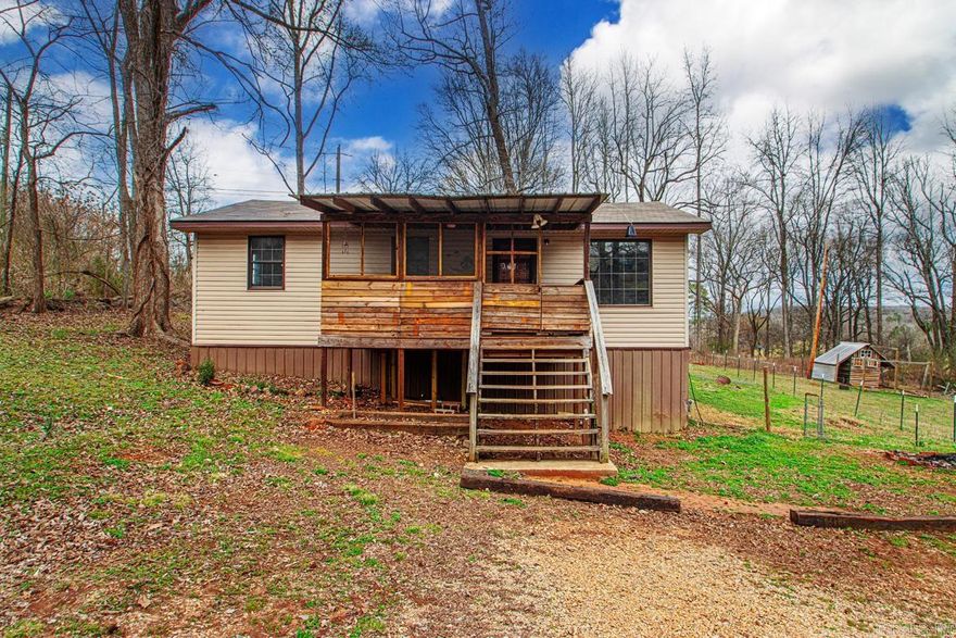 Charming 3-bedroom, 1-bath home situated on over half an acre in a peaceful setting near Magnet Cove School District. This cute property is perfect as a starter home or investment opportunity, offering comfortable living with plenty of outdoor space to enjoy. The spacious lot provides endless possibilities start a garden, raise chickens, or simply relax and take in the quiet surroundings. Enjoy country-style living with the convenience of being just minutes from amenities. Don’t miss this affordable opportunity with room to grow!