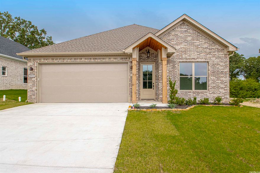 Open layout with lots of storage and a mudroom. Nice covered back porch for your low maintenance yard. 3 generous sized bedrooms plus an office. Kitchen offers top of the line appliances and custom cabinetry with ample storage and a large pantry.