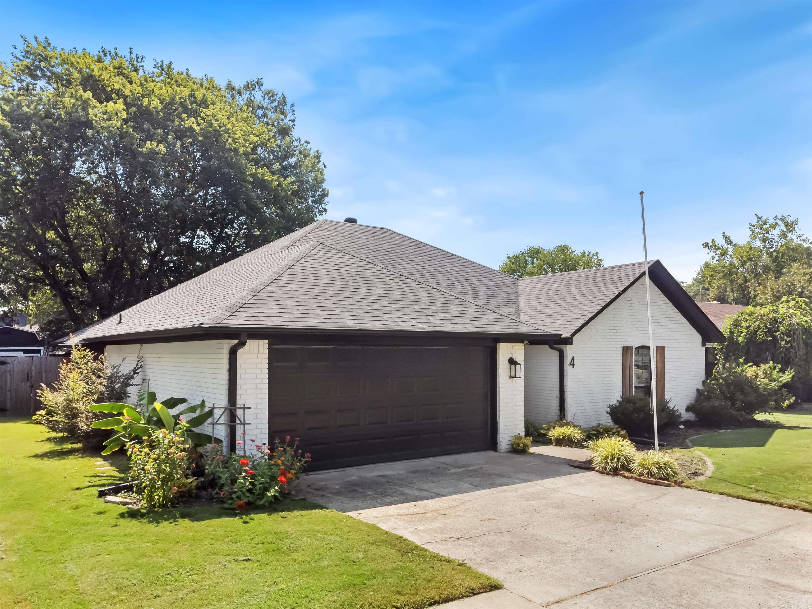 Welcome to this charming new listing in the heart of Conway! This lovely 3-bedroom, 2-bathroom residence offers a spacious 1,759 square feet of thoughtfully designed living space nestled on a generous quarter-acre lot. Step inside to find inviting features such as a cozy gas-burning fireplace, soaring vaulted ceilings, and an open living area perfect for entertaining. Enjoy the outdoors on the newer deck adorned with a stylish pergola, ideal for gatherings or tranquil evenings under the stars. The home is equipped with modern conveniences, including a 50 gallon hot water heater (2021), a new oven with an air fryer (2023), updated HVAC system (2021), and a new roof (2023). The recently installed windows (2021) ensure energy efficiency and comfort year-round. The serene neighborhood provides the perfect backdrop for leisurely strolls and is child-friendly, offering a spacious backyard for play and relaxation. Inside, the primary bathroom boasts a beautifully tiled walk-in shower, while the guest bathroom has been tastefully updated for your convenience. Despite its peaceful setting, you'll appreciate being just minutes away from a variety of amenities. 3D tour and drone footage too!
