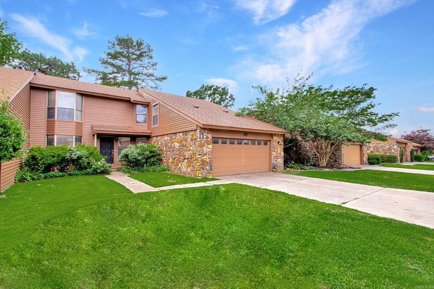 Completely renovated and move-in ready, this stunning 4-bedroom, 2-bath townhome is located in one of Maumelle’s most desirable golf course communities. Positioned directly on the 9th fairway of Maumelle Country Club, the backyard offers beautiful views of the course, perfect for peaceful mornings or entertaining guests in the evening.  The interior features vaulted ceilings, a grand fireplace, modern finishes, and an expanded kitchen complete with new granite countertops, a new center island, brand new appliances, and custom cabinetry. A wet bar near the living area adds a perfect touch for entertaining.   The primary suite is located on the first level and includes a remodeled bathroom and direct access to the back deck.  A dedicated laundry room adds convenience, while three additional bedrooms located upstairs provide versatility for family, guests, or a home office.  Additional upgrades include a new water heater, new sinks, updated plumbing, flooring, and upgraded fixtures throughout. A 2-car garage plus a separate golf cart garage provide excellent storage and easy access to the course. Don't miss your chance to own this exceptional property, schedule your showing today!