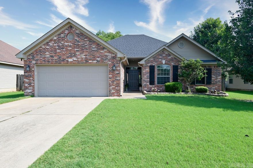 Welcome to this pristine 3-bedroom, 2-bathroom home in one of Bryant's quietest neighborhoods. This like-new home features a new roof from 2021, beautiful wood grain flooring, and modern finishes. The ample kitchen is equipped with a double oven and plenty of storage, complemented by a cozy fireplace in the living room. The expansive sunroom overlooks a park-like backyard, perfect for play and entertainment. With additional storage in the attic and outside, this home combines convenience and charm. Don't miss this exceptional opportunity. Contact a Realtor for a viewing now.