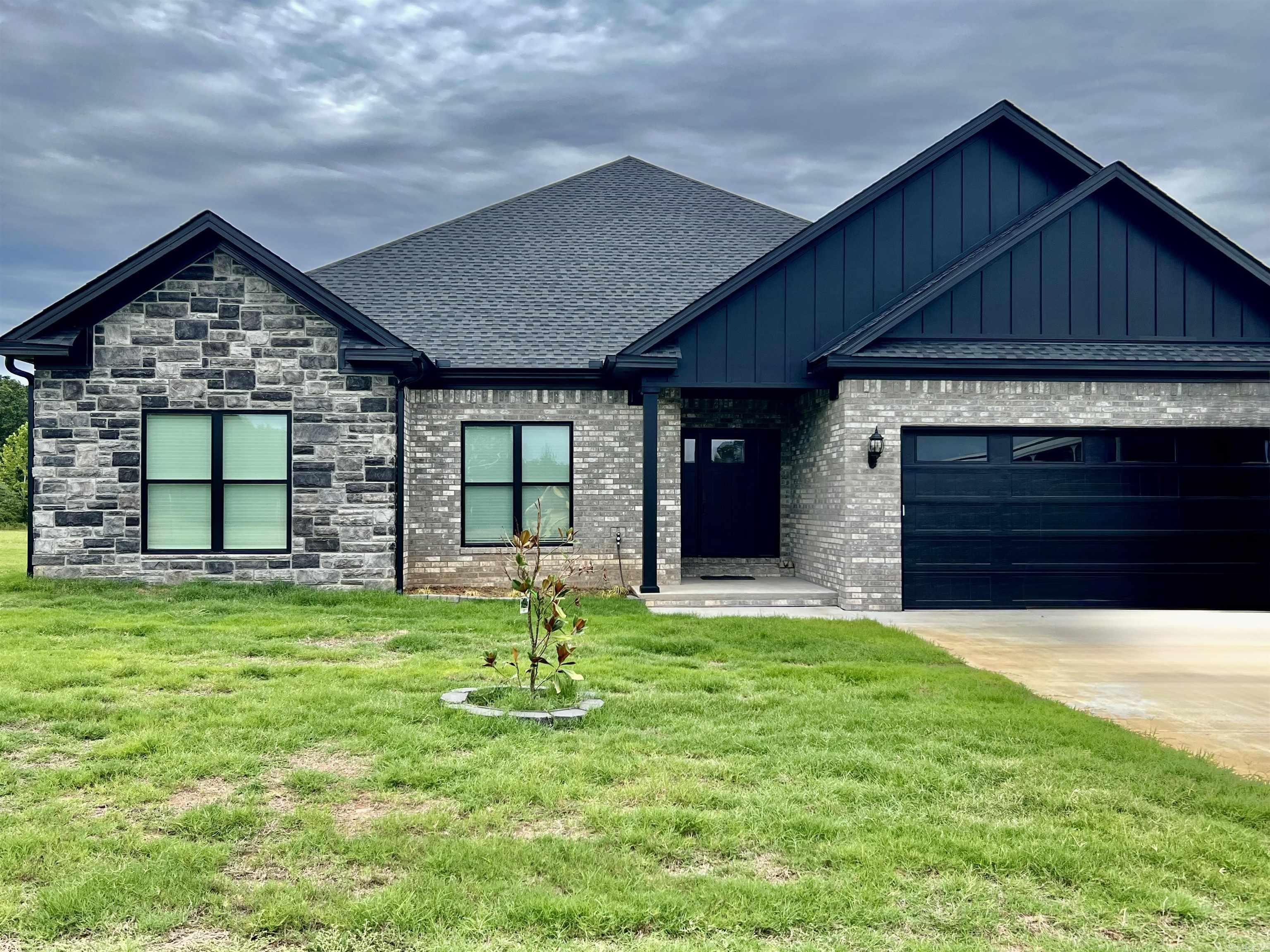Motivated Seller! BEAUTIFUL COMPLETED NEW CONSTRUCTION HOME READY FOR A NEW OWNER! This home is just on the outskirts of Conway city limits which makes for an easy commute. 4BD 21/2BA open floor plan on 0.80 acres. Split floor plan with Luxury vinyl throughout except tile in the wet areas, Kitchen has quartz countertops with tiled backsplash, 8ft Island bar, custom cabinets with underneath lighting, stainless steel appliances, pantry. Tankless water heater, Master walk in closet, tile shower & Soaker tub, quartz countertops in both bathrooms, Oversized Garage for those with big vehicles or a boat. Covered back porch with patio.This home also comes with REFRIGERATOR, WASHER, and DRYER. This home qualifies for Rural Development (100% financing). The road has been paved. This home is a must see!