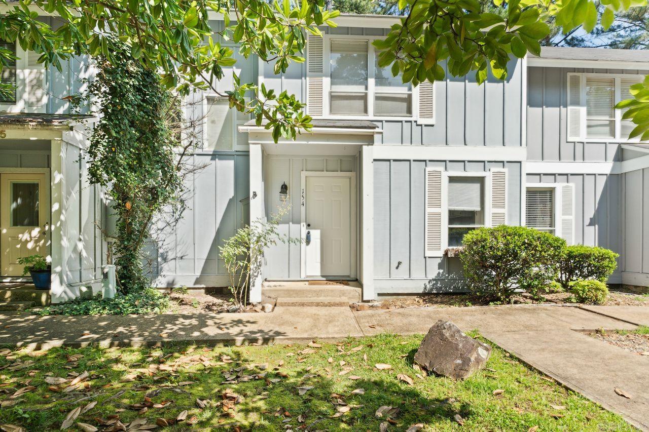 Enoy low-maintenance living with stunning views of Desoto golf course from this beautifully updated 2-bedroom, 1.5 bath townhouse, located at the end of a quiet cul-de-sac near the West Gate. Step inside to find fresh paint, new flooring throughout, and a new stove in the kitchen. Relax year round on the screened-in back porch while soaking in the serene golf course scenery. Whether you're looking for a weekend getaway or a full-time home, this one check all the boxes. Don't miss the opportunity to live in one of America's most sought-after gated communities. First time property owners in Hot Springs Village are subject to a one-time $2,000 buy-in fee to the POA at closing.