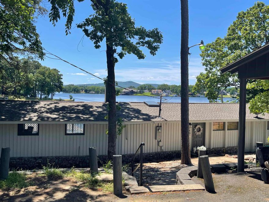 Location. Location. Location!  Prime Lake Hamilton lakefront with breathtaking panoramic views of the main channel, with Mount Riante backdrop.  Driving location is near all of the area amenities as well as easy access to US 70/270 bypass.  All of the furniture is NEW and included in the sale.  Whether a main residence, vacation home, or investment; this is an attractive asset for anyone's real estate portfolio.