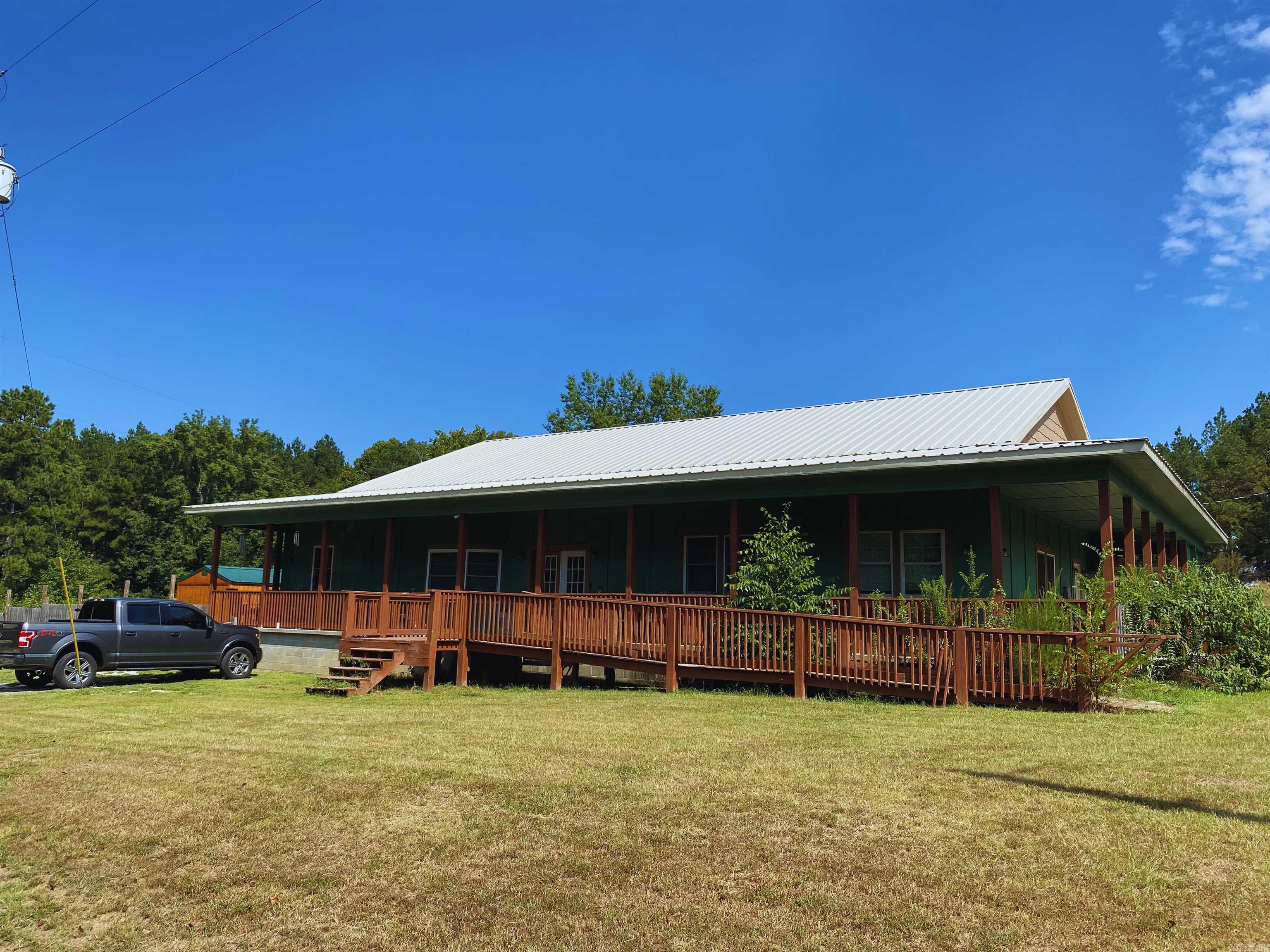 Custom-built home with exceptional attention to detail! Features include a wrap-around front porch, large back deck, and a spacious backyard with storage shed and whole-house backup generator. Inside boasts a massive ~30x49 great room, 3 bedrooms, 2 bathrooms, and 2 bonus rooms. The master suite offers a walkthrough closet to the laundry room and a luxurious en suite with soaking tub and walk-in double shower. There is an addition bathroom that is unfinishedāperfect for future customization. A rare blend of space, style, and smart design!