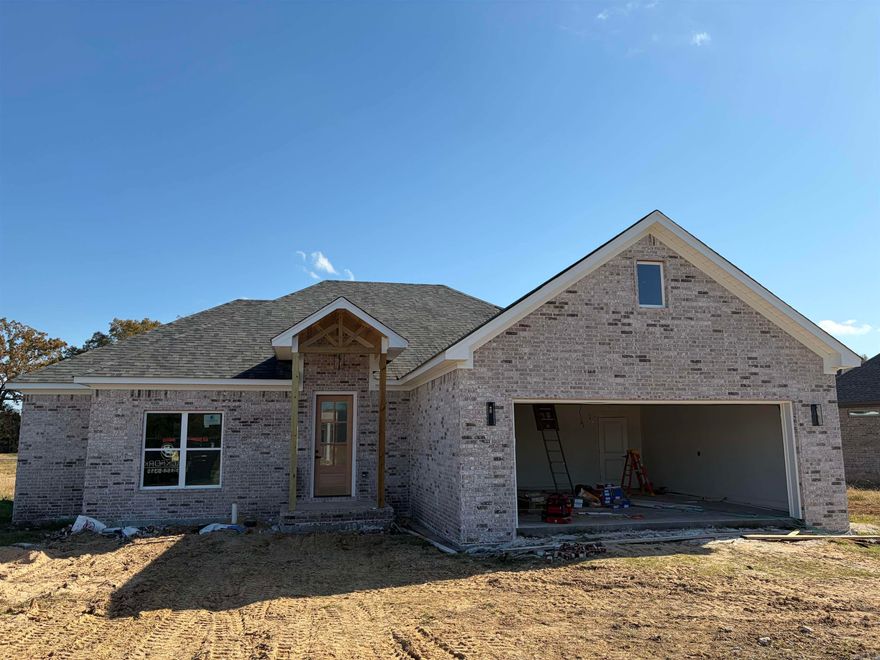 Beautiful home under construction in Morrilton. Agents, see attached documents to see the floor plan and finishings.