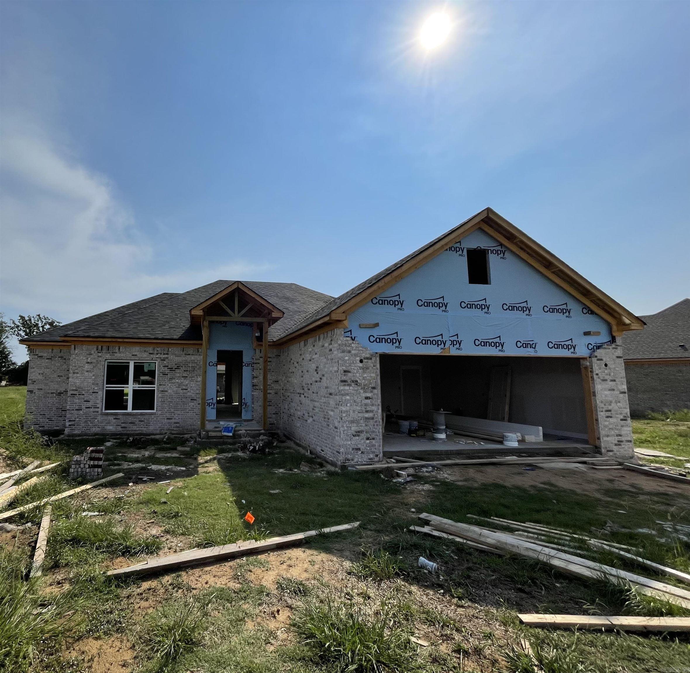 Beautiful home under construction in Morrilton. Agents, see attached documents to see the floor plan and finishings.