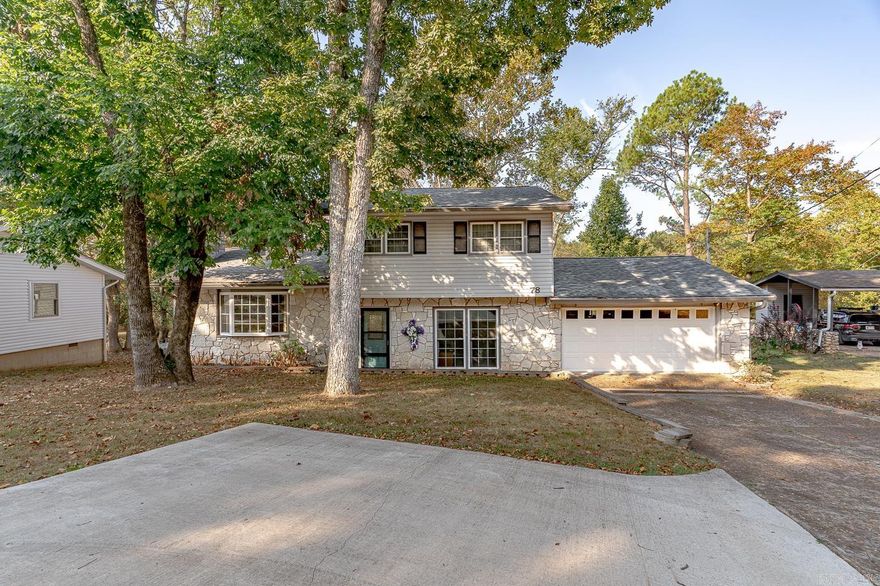 Welcome to Market 78 Altakima Circle of the Kima 2nd Sub. in Cherokee Village, AR. Situated on a .34 +/- acre cul-de-sac lot near the South Fork of the Spring River is a renovated home wrapped in stone & vinyl, topped w/ architectural shingles, and accented by shutters, gutters, 2 car garage, sunroom, gorgeous front door with side-lite, and beautiful landscaping. The interior holds 2,112 sf of well laid out space over 2 floors. The main level features the living room, dining room w/ ventless gas fireplace, kitchen w/ stainless steel appliances, granite countertops, backsplash, pantry, peek-a-boo cabinets, island w/ seating, and access to the sunroom w/ tree-lined views. The Master wing contains a built-in desk, laundry room, and Master w/ walk-in closet, access to the deck, and en-suite w/ dual vanity and tiled walk-in shower. Upstairs is a 2nd Master w/ en-suite that holds a shower/tub combo and vanity, 2 guest bedrooms, and guest bathroom w/ walk-in shower.  You'll love the hardwood floors, under cabinet lighting, 12x10 outbuilding, French Drain, extra parking pad, and all the amenities the village has to offer.  Call today to make this house your home or home away from home.