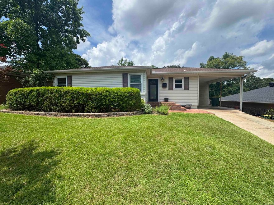 Beautifully updated 3-bedroom, 2.5 bath home in the desirable Park Hill neighborhood! Enjoy two living areas, all-tile floors, custom oak kitchen cabinetry, and numerous upgrades throughout. The spacious primary suite features a large walk-in closet with direct access to the primary bathroom. Recent improvements include a new deck, HVAC system replaced in 2018 (A/C, furnace, evaporator coil, and pad), windows replaced in 2007, and a water heater only 2 years old. The refrigerator, washer, dryer, Vivint alarm panel, and Nest thermostat all convey. A dedicated internet line runs from the house to the detached studio/workshop, which has its own router—perfect for remote work, hobbies, crafts, or a man cave. Additional features include a fixed gun-safe closet and an interior basement that provides excellent storage and serves as a storm shelter during severe weather.The new deck, detached studio, and basement provide substantial usable space beyond the home’s listed square footage. Conveniently located near shopping, restaurants, and interstate access, this move-in-ready home offers comfort, flexibility, and value in one of North Little Rock’s most sought-after neighborhoods.