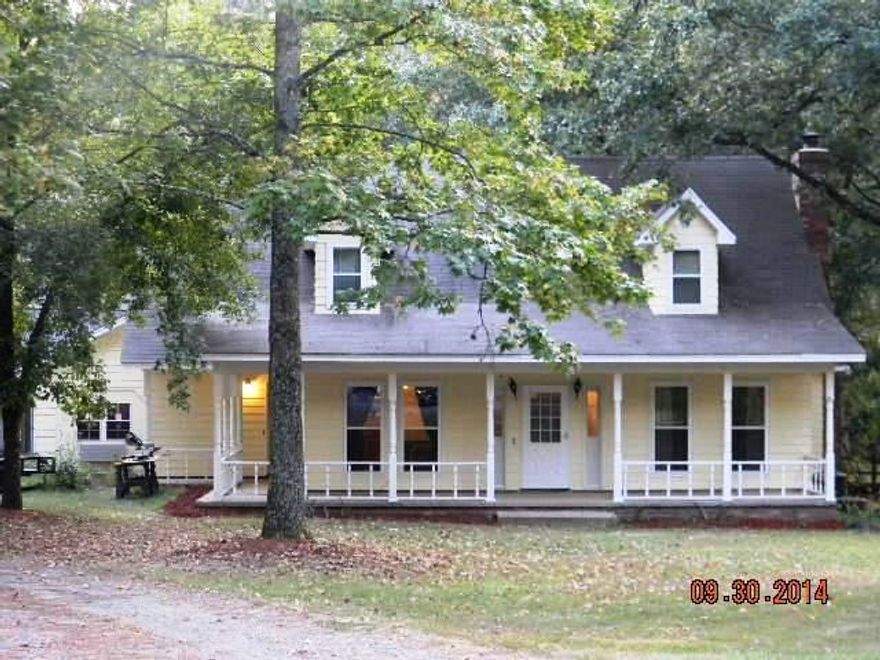 Large 3 bedroom, 3 bathrooms, home nestled away in country setting. Tons of storage. Upgrades to include new windows, wood stove, heat/air, granite counter tops, hot water heater. Huge 2 story shop- could also be used a detached garage. Extra parking & storage shed, screened-in porch for nice cool evenings to relax.