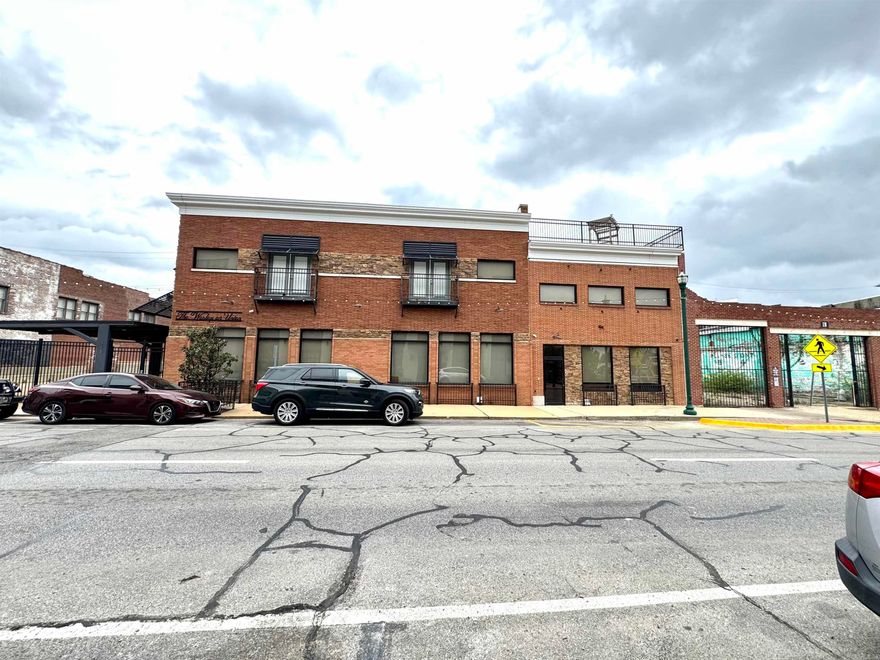 Check out this incredible investment opportunity with Downtown Jonesboro's premiere luxury lofts! Includes nine spacious 2-bedroom, 2-bath units, plus two large 1-bedroom, 1-bath units. Each one features floor-to-ceiling windows, exposed brick, tall ceilings, and an open, modern layout. Private entrances add a nice touch of privacy and safety for tenants. Inside, the units come fully equipped with all appliances, including high-end GE washers and dryers, dishwashers, microwaves, custom cabinetry, and stylish IKEA lighting. Tenants also enjoy expanded cable and internet. Convenient gated parking with 8 spots, plus plenty of street parking right out front. Two private decks with a fire pit give residents a cool spot to hang out and relax. Located just one block from the Downtown Entertainment District and super close to ASU and medical centers, it's hard to beat this location. Low maintenance costs just make it even sweeter. Schedule a tour of this great multi-family opportunity today!