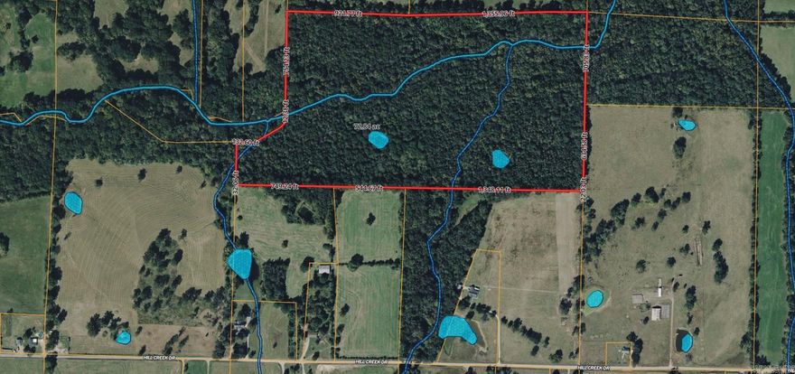 Nice Private 75 acre tract. Mature Trees, Prairie Creek winds through the property.  Has a good spring located on property next to a old homestead