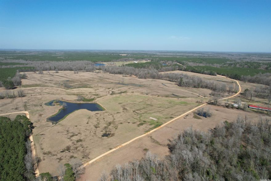 This 309 acre +/- multi purpose tract is located in northern Grant County just northwest of Sheridan, Arkansas. Approx. 200 acres of this farm is pastured acres whether your goal is to run cattle or for hay production. Centrally located is a 50x200 foot hay / equipment barn as well as an additional 20x30 metal building with concrete floors for a working shop or storage. The farm is fenced / cross fenced and has a few ponds as well as a year around Little Lost creek dissecting the farm north to south. In addition, there is approx. 50 acres +/- of mature hardwoods along with scattered pockets of timber and tree lines as well as a 160 foot power line R-O-W that would be a great shooting lane. Upon arrival there is a secured gated entrance with a coded entry and where the city water and power enters the property. The neighboring landowner lives on the backside of the farm and has a 20 foot easement for ingress and egress as well as access to the gate. Sheridan School District. This would make a great farm, place to build a home on, or a place to get away to fish, turkey / deer hunt. Give us a call today to take a look!