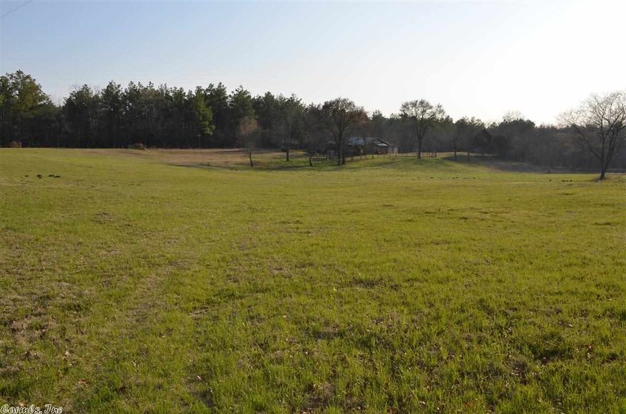 This is a very quiet, secluded! It's near the river, last home on a county roadSeparate dining room, separate living room and HUGE den. 700 sq ft shop, barn, 2 ponds.  Lots of deer and other wild life.  Fruit trees and gorgeous pasture.  House has lots of character, 3 bedrooms downstairs, 1 upstairs in the open loft. Wood burning stove in living room, kitchen was recently updated, fresh paint, newer floor covering throughout.