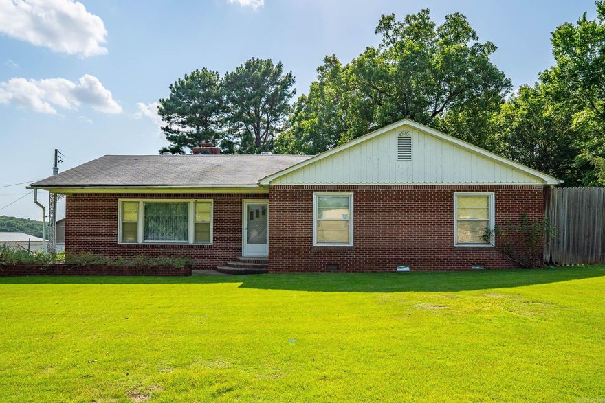 PRICE REDUCED! Great location for your business! There are ample possibilities for this house with land right on HWY 65N.There's already a 1696 sq. ft. building that could be used as office space with lots of storage. 3 bedrooms, 1 bath, large living area and a kitchen/dining area for an employer break room. Microwave, washer and dryer and mostly full propane tank convey. It sits on 2.21 acres with 395.8 feet of road frontage for excellent visibility. Between Conway and Springhill/ Greenbrier and only 2 miles from I-40 access. Give it a rehab or start fresh but have your business seen!