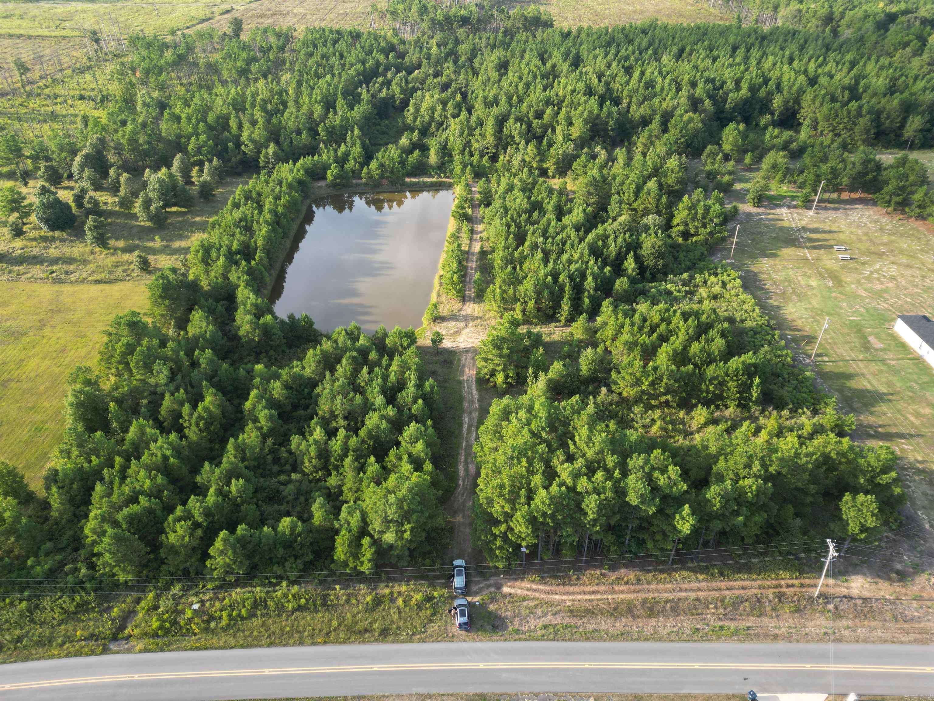Beautiful property to build your dream home with lots of privacy. Stocked pond and some dirt work has been done by the Seller. Sportsman's paradise with deer and fishing.