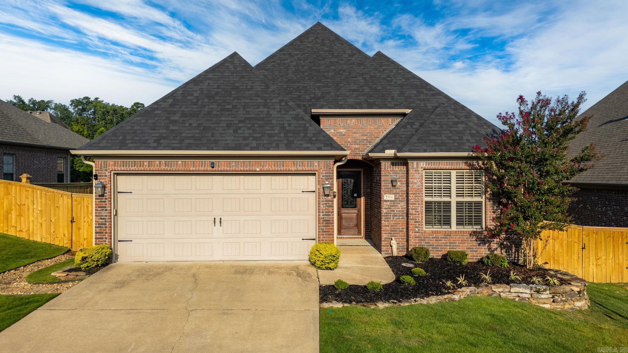 Welcome to this Chenal oasis in Wildwood Ridge where your yard maintenance is handled by the POA! Open Sunday 9.7.2025 from 2-4pm. 2314 Gordon Road is a charming, one-owner home built in 2013 by Graham Smith with Luxury appliance upgrades and GREAT owner updates including new roof in 2024, screened in terrace, and outdoor living area with plumbed grill and gas fireplace. Offering 3 bedrooms, 2 baths, and 1,859 square feet of open flow living space, this beautiful and inviting retreat is a standout. Partially floored attic. Thoughtfully updated, lightly occupied and move-in ready, this home provides both comfort and convenience in one of Chenal's most sought-after areas.