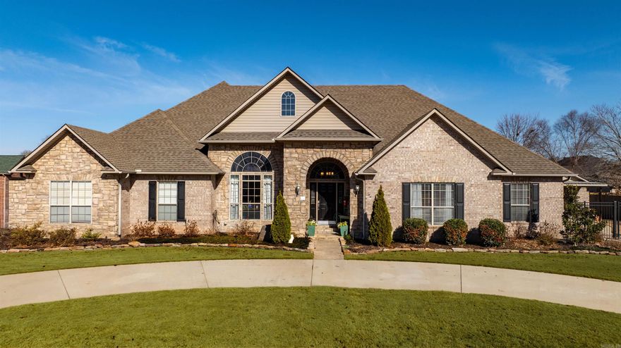 This spacious 3048 sq ft home offers 4 bedrooms and 2.5 baths with a thoughtfully designed open floor plan, all on one level. Enjoy two oversized living areas—one with a fireplace and a separate office space—perfect for entertaining or working from home. The kitchen features granite countertops, abundant counter space, a large island, double ovens, and a walk-in pantry. The split floor plan includes a luxurious primary suite with tray ceilings, double vanities, shower, soaking tub, and a large walk-in closet with built-ins. Three additional bedrooms each offer walk-in closets. The oversized garage includes floored storage above, an 11x5 workshop area, a 30-amp RV plug, and extra parking. A fully ADA-compliant guest house built in 2018 adds incredible value, featuring a full kitchen, roll-in shower, 1 ton AC (2021), and an F-5 rated storm shelter for 10+ people that doubles as a walk-in closet. A 16kW whole-home generator power both homes, offering comfort, flexibility, and peace of mind.