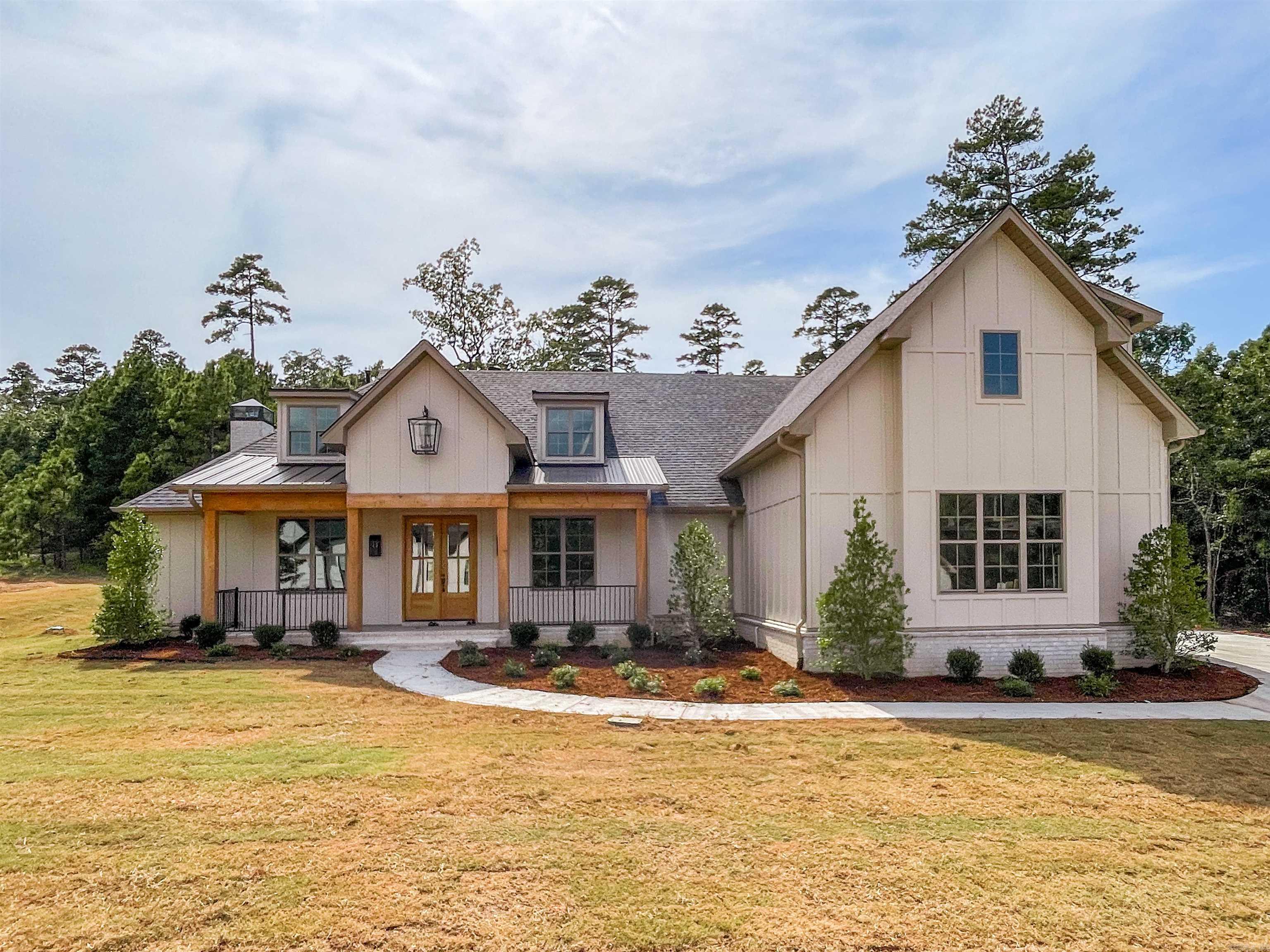 .5 Acre lot with 115' of road frontage, backing up to 7.5 acre tract of permanent wooded greenspace, home faces East. Open floorplan with large great room, dining, kitchen area-beautiful interior/exterior finishes on a half acre lot that backs up to a beautiful greenspace area.